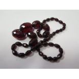 A Faceted Cherry Faux Amber Bead Necklace, 45g