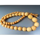 An Amber Bead Necklace, 74.4g, 78cm