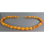 A Baltic Amber Bead Necklace, 57.4g