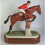 A Royal Worcester limited edition model, Foxhunter and Lt. Col. H.M.Llewellyn, C.B.E., modelled by