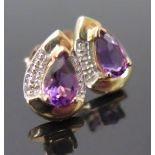 A Pair of Amethyst and Diamond Stud Earrings