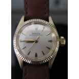 A Rolex Ladies 9ct Gold Oyster Perpetual on a genuine Rolex Leather Strap