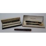 A Waterman's 513 Boxed Fountain Pen and Pencil Set, silver mounted pen and damaged Parker vacumatic