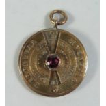 A nineteenth Century Yellow Metal and Amethyst Perpetual Calendar Pendant _ registered June 14th