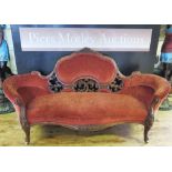 A Victorian Carved Walnut Sofa