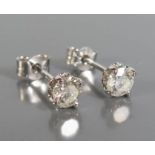 A Pair of Diamond Stud Earrings, c. 0.75ct