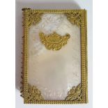A Nineteenth Century French Aide Memoir with mother of pearl panels and gilt metal mounts and with