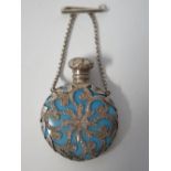 A Nineteenth Century Turquoise Glass and Silver Mounted Scent Bottle with pin brooch fitting