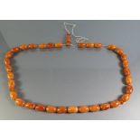 An Amber Bead Necklace, 54.2g