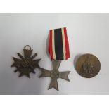 1936 GERMAN NAZI PARTY BADGE AND TWO 1939 NAZI CROSSES