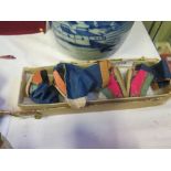 FOUR CHINESE EMBROIDERED SILK MINIATURE SHOES IN BOX