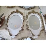PAIR OF WHITE AND GILT FOLIATE FRAMED WALL MIRRORS