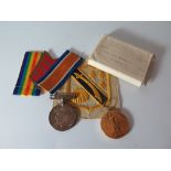 A WWI Medal Pair inscribed to 33731 PTE. A.E. BRISTOW. L.N.LAN.R. and cloth badge