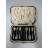 A George V Silver Presentation Cased Set of Six Silver Coffee Spoons with tongs