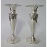 A Pair of Victorian Loaded Silver Vases with pierced s-scroll foliate rims, Birmingham 1900, John