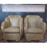 A Pair of Art Deco Walnut Cloud Armchairs