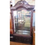 A Nineteenth Chinese Rosewood Mirror Back Display Cabinet with twin doors below carved with birds