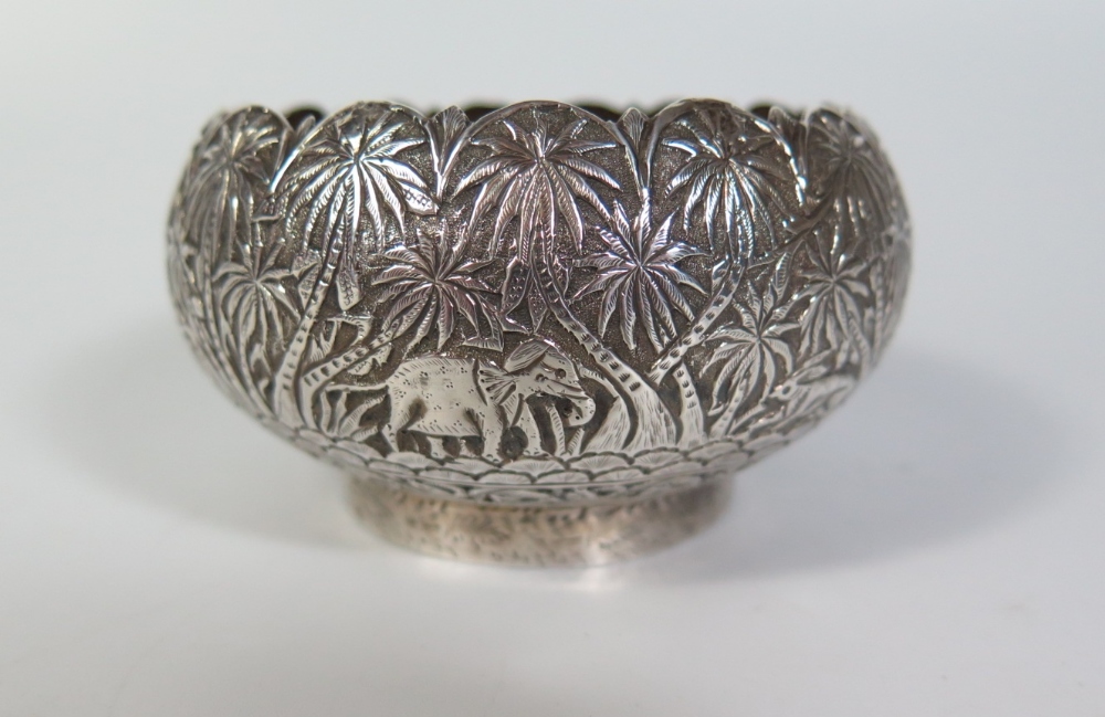 An Indian Silver Bowl decorated with palm trees and animals, 108g