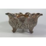 An Indian White Metal Trefoil Shaped Bowl decorated with palms and animals, 235g