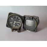 A British Armed Forces Aeroplane Clock by Camerer Cuss and compass