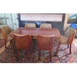 An Art Deco Dining Suite Comprising a set of six walnut dining chairs with original leather