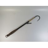 Brass and steel fishing gaff with turned wooden handle