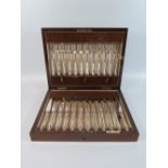 A Walker & Hall Electroplated Silver Set of Twelve Fruit Eaters in mahogany case