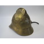 A Swiss Brass Fireman's Helmet