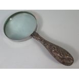 A Silver Handled Magnifying Glass