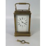 A French Brass 8-day Repeating Carriage Clock retailed by Rowell of Oxford