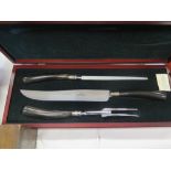 A New Cased Mitchell Monarch Horn Handled Carving Set and Italian boxed set of champagne glasses