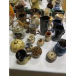 A Collection of Studio Pottery and Whisky Water Jugs