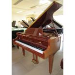 Reid Sohn
A modern 4ft 7in Model SG-140A grand piano in a bright mahogany case on square tapered