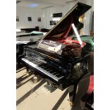 Bösendorfer New Stock A 6ft 1in Model 185 grand piano in a bright ebonised case on square tapered