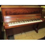 Rogers (c1988)
A traditional upright piano in a satin mahogany case.
