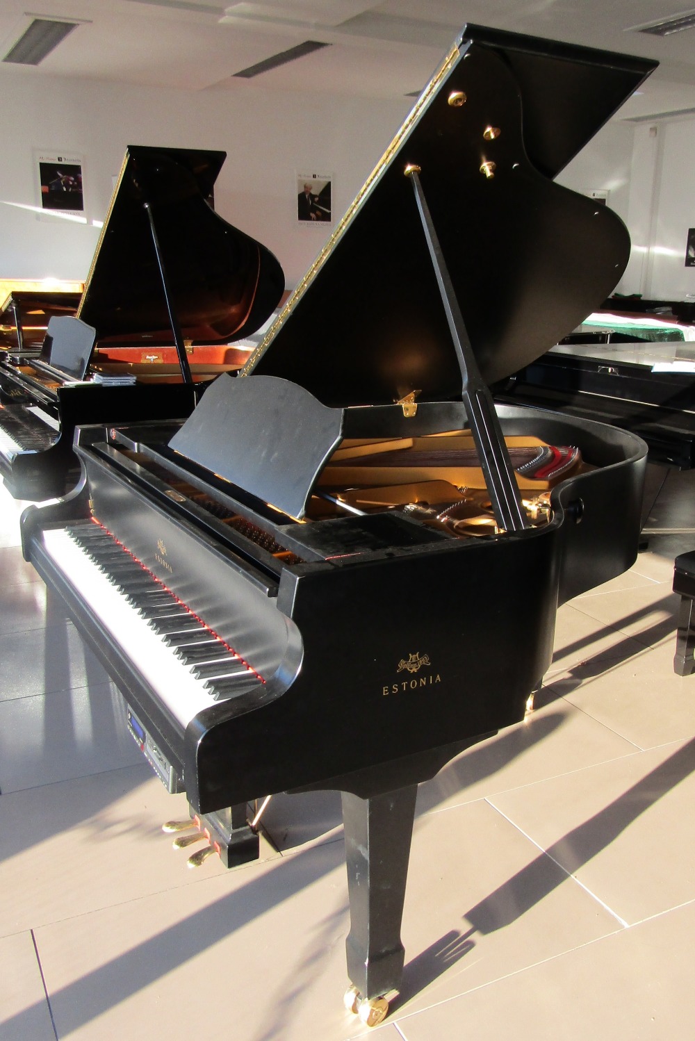 Estonia (c1997)
A 5ft 4in Model 162 grand piano in an ebonised satin case on square tapered legs,