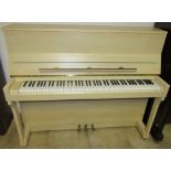 Weinbach (c1999) An upright piano in a satin beech traditional case. AMENDMENT.