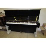 Yamaha (c1969)
A Model U1 factory rebuilt upright piano in a bright ebonised case.