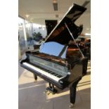 Bechstein (late 19th century)
A 6ft 7in Model V grand piano in a bright ebonised case raised on