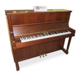Kemble New Stock 
A Conservatoire Model 124 upright piano in a satin American walnut traditional