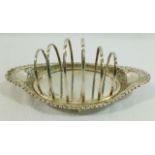 A Victorian silver six bar toast rack and tray, Sheffield 1890,