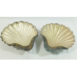 A pair of shell-shaped silver butter dishes with frosted glass liners, Sheffield 1928,