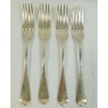 Four George III old English pattern silver dinner forks, London 1817, maker's mark 'SP', 19cm long,