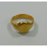 A yellow metal signet ring, engraved initials worn, unmarked, 12.