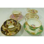 Four H & R Daniel porcelain cups and saucers comprised of a second gadroon shape coffee cup and