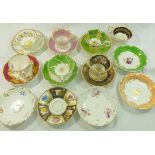 Six matched H & R Daniel porcelain cup and saucers and five additional saucers and one coffee cup,