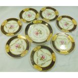 A set of seven H & R Daniel porcelain tea plates and a shallow bowl or stand, with plain edge,