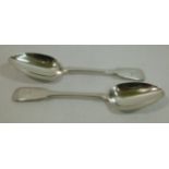 A pair of early Victorian Irish silver fiddle pattern serving spoons with rat tail bowls,