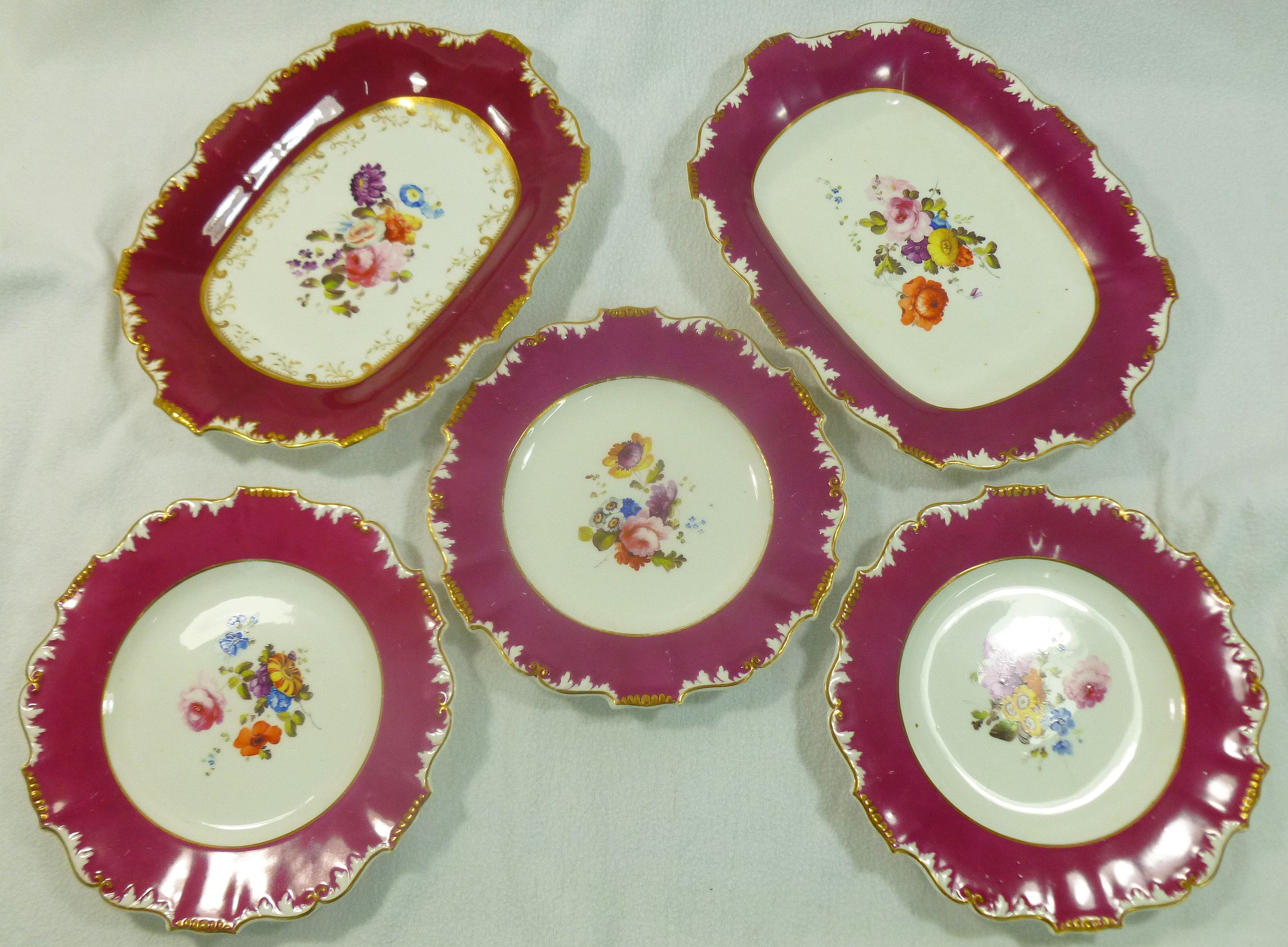 A part H & R Daniel dessert service comprised of three plates and an oval dish, Shrewsbury shape,