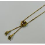 A Victorian gold belcher link necklace with garnet set heart-shaped gatherer and tassel terminals,